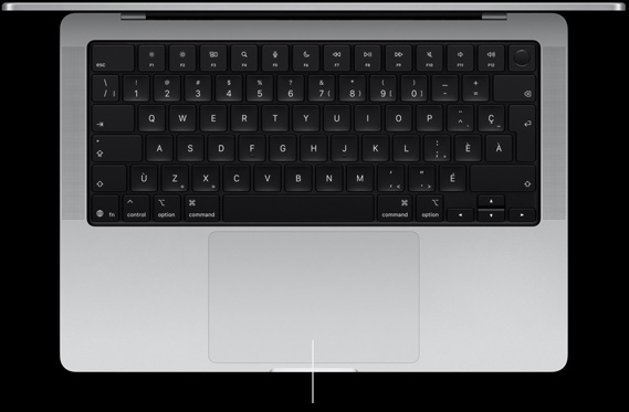 Vue en plongée d’un MacBook Pro 14 pouces ouvert montrant le pavé-pression situé sous le clavier