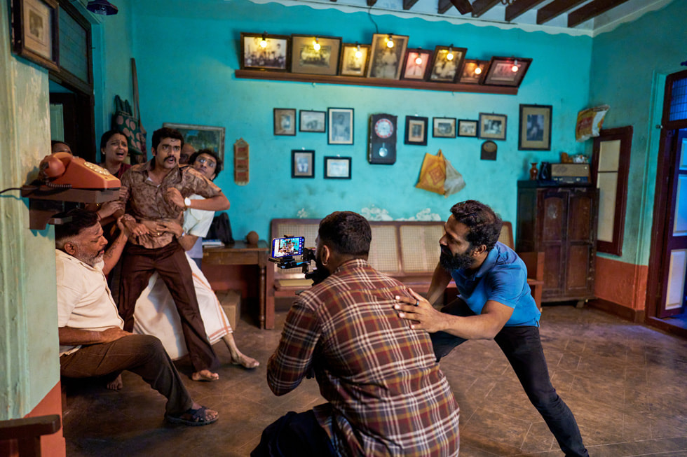 Vetri Maaran (right) and Vighneshwar on set with iPhone 16 Pro Max.