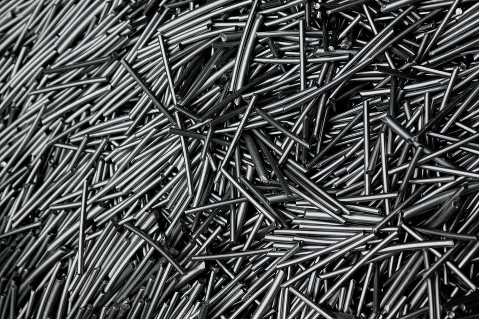 A pile of thousands of titanium rods at Perryman Company’s facility.