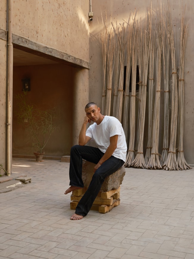 A portrait of Salem S. Charabi, part of Apple’s 2026 Designers of Tomorrow showcase.