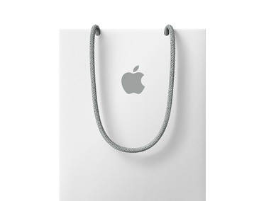흰색 Apple Store 쇼핑백, 회색 Apple 로고와 회색 손잡이가 달려 있습니다