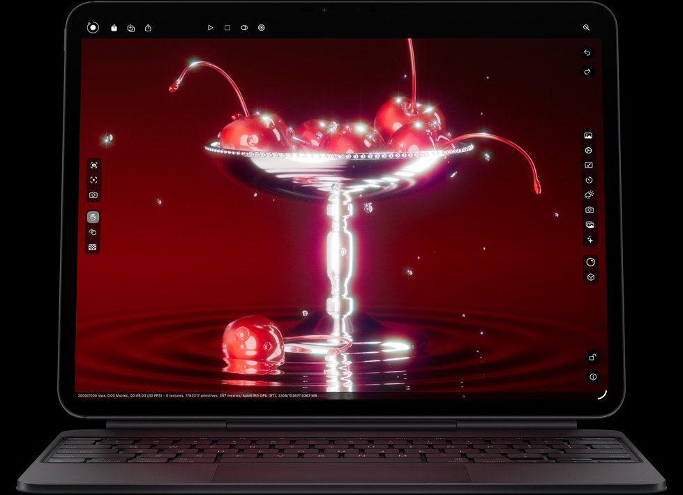 iPad Pro, landscape orientation, front exterior, space black colour, rounded corners, black display bezel, attached to Magic Keyboard in landscape orientation, front exterior black colour, screen displaying photo editing app with a vibrant image of cherries in a martini glass–shaped bowl with water droplets