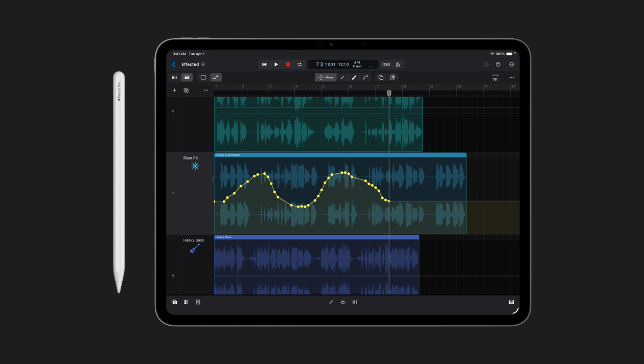 iPad Pro 13 screen workspace showing drawing over the sound wave in Logic Pro, Apple Pencil to the left of device