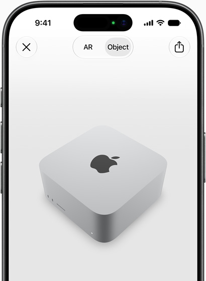 Un iPhone previsualizando un Mac Studio con realidad aumentada