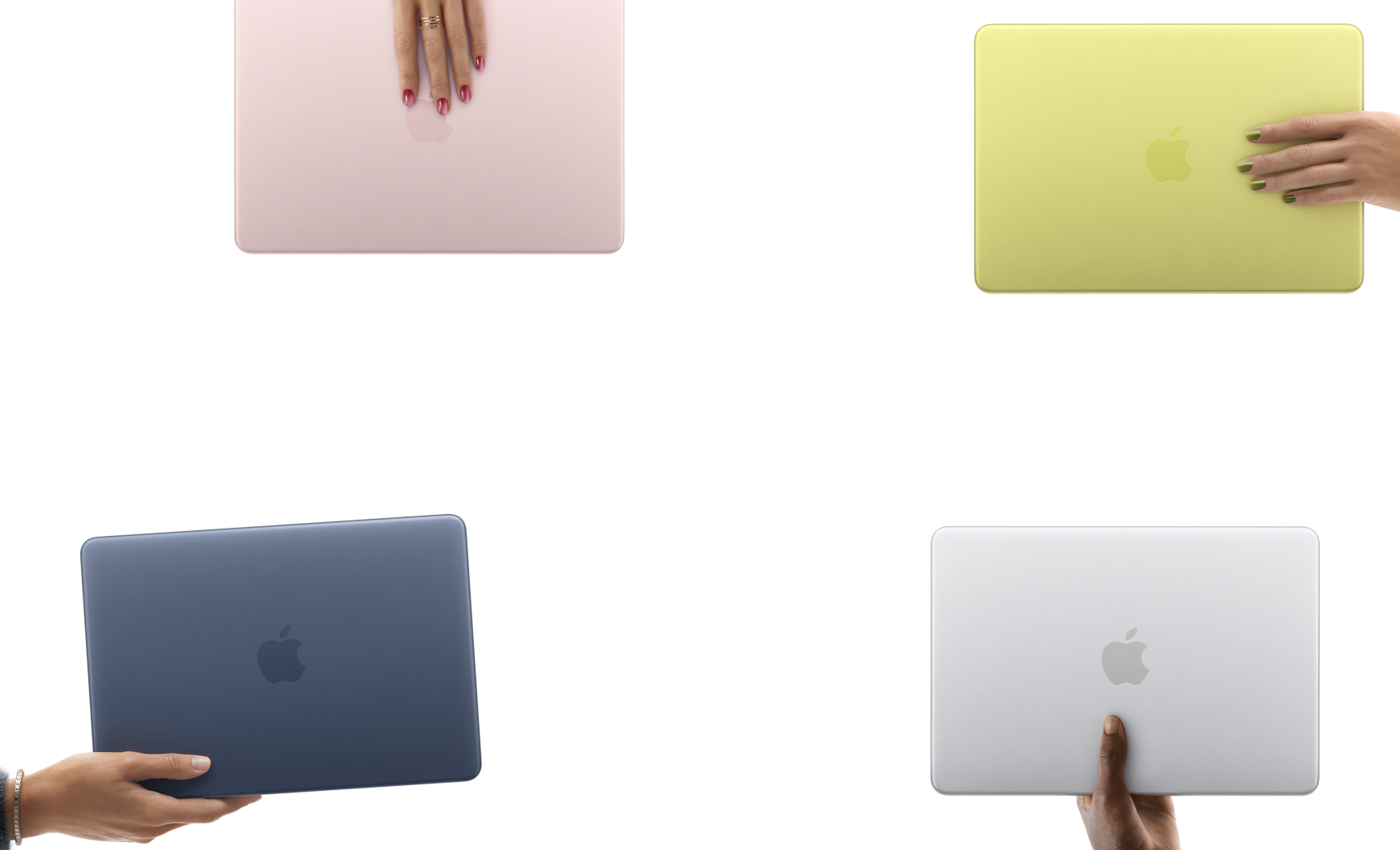 幾部不同顏色的 MacBook&nbsp;Neo 手提電腦，由不同人的手握持